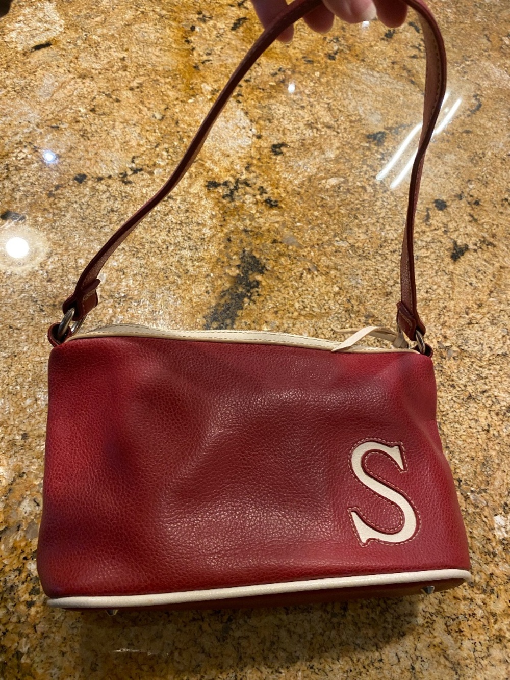 red handbag, S monogram
